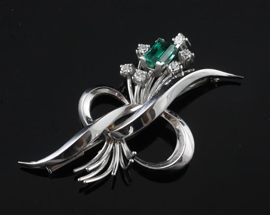 A Venezuelan 18ct white gold emerald and diamond spray brooch, signed Bauer, 2in.